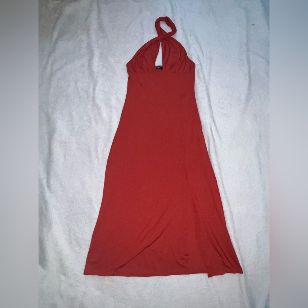 Cross strap Burnt Orange dress. Flowy and has a open leg